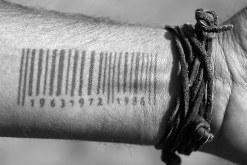 Arm with barcode tattoo